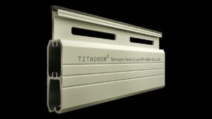 Cửa Cuốn Đức Khe Thoáng Titadoor PM1020S, Móc dày 1.55mm, Chân chịu lực dày 1.6 – 2.6mm – TL 14,6kg/m2